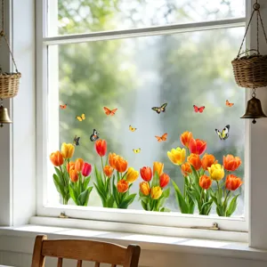 Detailed view of colorful tulip and butterfly static window decals in a sunlit room.