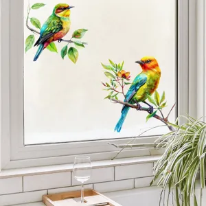 Detailed view showing colorful bird on branch window sticker in a bright kitchen