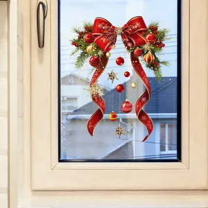 Festive Christmas window sticker featuring a large red bow pine branches and ornaments