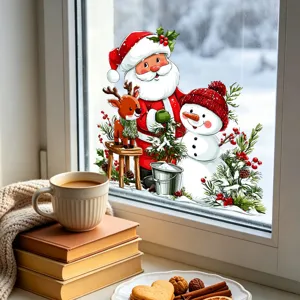 Festive Santa Claus and snowman static window sticker applied on a cozy winter window