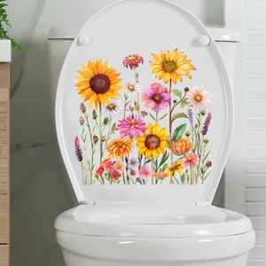 Detail van kleurrijke zonnebloem- en wilde bloemenstickers op een witte toiletdeksel.