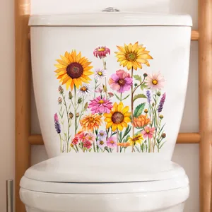 Detailweergave van kleurrijke aquarel zonnebloem en wilde bloemstickers op toiletstorting