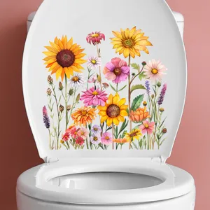 Kleurrijke waterdichte sticker met zonnebloemen en wilde bloemen op een witte wc-bril.