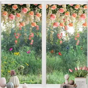 Decorative floral and butterfly window stickers applied to a bright glass window