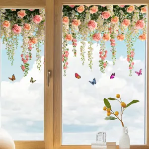 Detailed view of colorful rose flower hanging baskets and butterfly window decals on glass