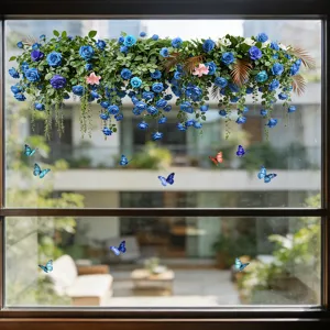 Prachtige statische stickers met blauwe rozen en vlinders op een glazen venster