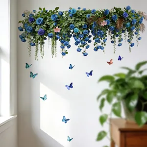 Elegant blue flower vine and butterfly wall decals decorating a white living room wall