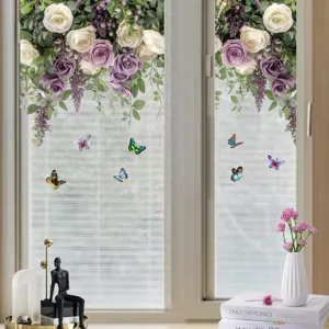Double-sided butterfly and flower window stickers displayed on a clear glass window