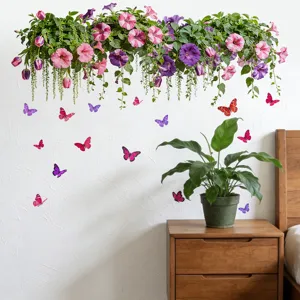 Detail view of colorful butterfly and floral wall stickers in a cozy bedroom setting