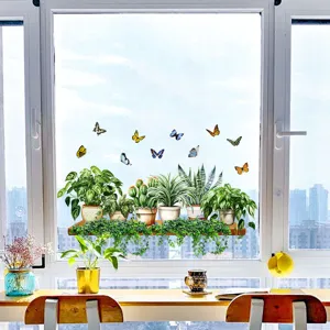 Static cling window stickers featuring green plants and colorful butterflies on glass