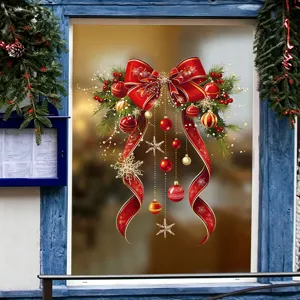 Close-up of festive red bow and baubles on a static cling Christmas window sticker