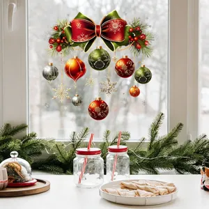 Detail view of festive Christmas bow and hanging ornament static glass window stickers