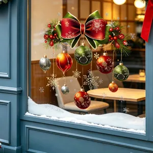 Elegant Christmas bow and bauble static window stickers displayed on a glass shop front