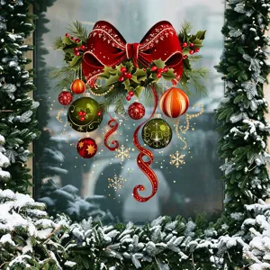 Festive Christmas window sticker with red bow, baubles, and gold snowflakes on glass.