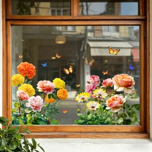 Vibrant floral and butterfly static window decals applied on a shop glass window pane