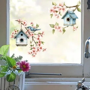 Bird and blossom window stickers applied to a bright kitchen window glass.