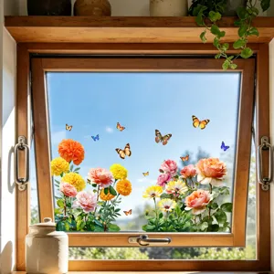 Vibrant floral and butterfly static window decals applied on a sunlit glass pane