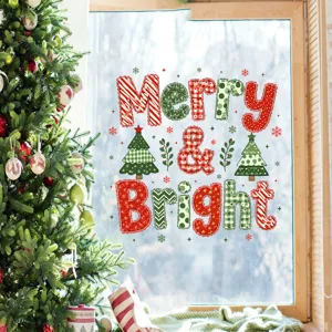 Detailed view of 'Merry & Bright' Christmas window sticker applied to glass pane.