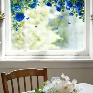 Detailed view of blue rose and butterfly static window stickers in a home setting