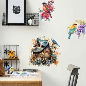 Detailed artistic bird and birdhouse wall stickers decorating a modern living room wall
