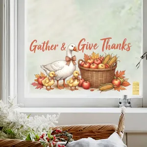Dettaglio dell'adesivo per finestre autunnale con oca e testo Gather & Give Thanks