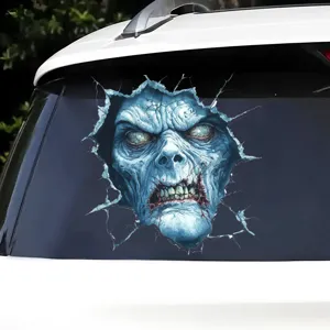 Detail view of a 3D horror zombie decal breaking through white car window glass surface