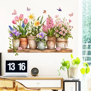 Detalle de vinilos decorativos de tulipanes y macetas coloridas en una oficina moderna