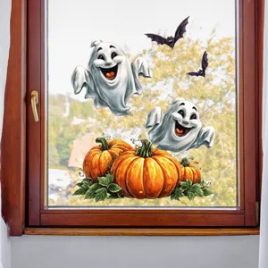 Gros plan de stickers d'Halloween pour fenêtres avec fantômes et citrouilles sur verre