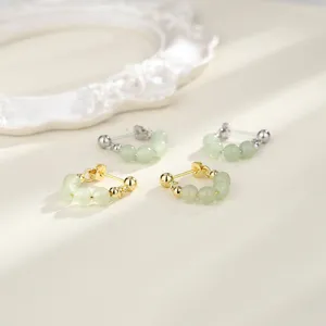 Detailed view of New Chinese style pale green jade bead earrings in gold and silver