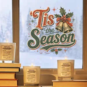 Vintage 'Tis the Season Christmas window sticker on a cozy snowy window scene.