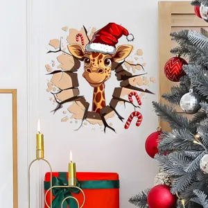 Close-up detail of a festive 3D giraffe wall sticker with a Santa hat bursting through wall