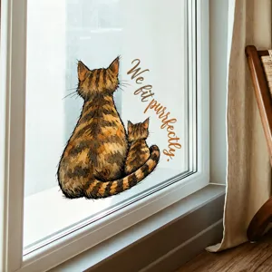 Decorative cat window sticker with 'We fit purrfectly' text for cozy home decor.