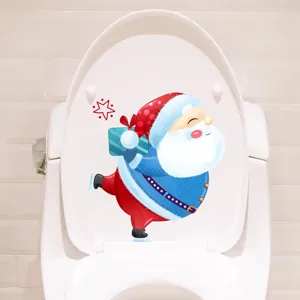 Festive Santa Claus skating sticker applied on a white toilet lid cover