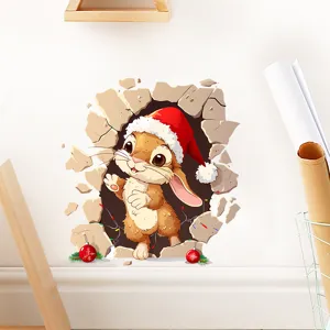 Detailed view of a 3D broken wall Christmas bunny sticker on a plain white wall
