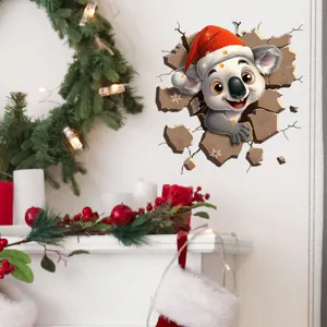 Detail of 3D Christmas koala wall sticker with Santa hat breaking through a wall