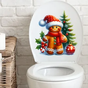 Vue détaillée d'un autocollant de Noël bonhomme en pain d'épices sur un couvercle de toilette.