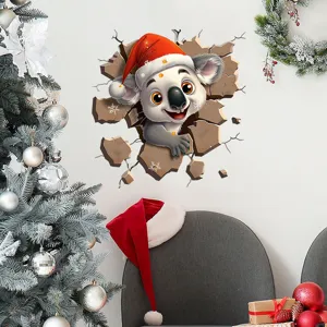 Close-up of 3D Christmas koala wall sticker with festive hat and broken wall effect