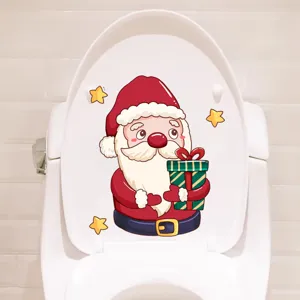Festive cartoon Santa Claus toilet lid sticker decoration for Christmas bathroom decor.