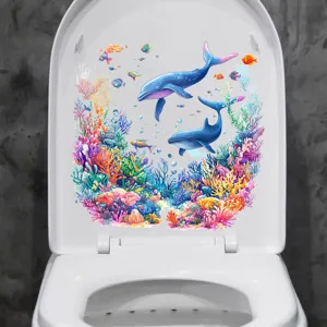 Close-up of vibrant underwater whale and coral decorative sticker on a toilet lid