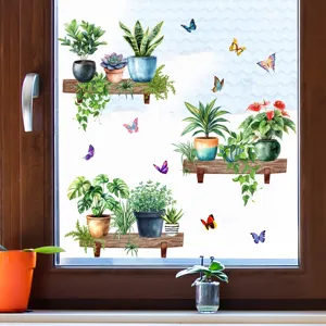 Watercolor potted plant and colorful butterfly window stickers on a realistic glass pane.