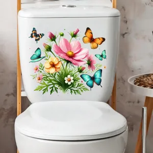Colorful floral and butterfly waterproof stickers applied to a white toilet tank.