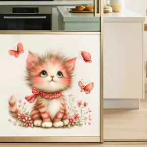 Watercolor kitten and butterfly wall sticker applied on a clean kitchen cabinet surface