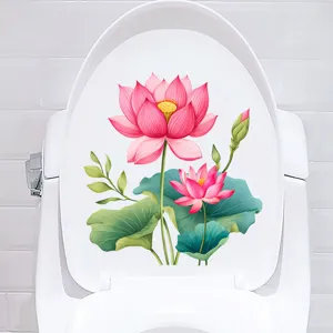 Artistic pink lotus flower waterproof sticker decal applied to a white toilet lid for bathroom decor