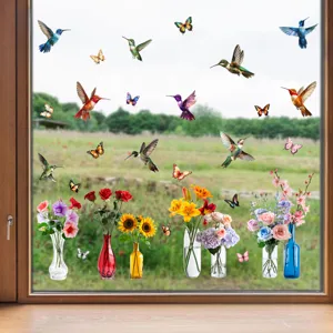 Colorful hummingbird and flower static window clings applied to clear glass surface