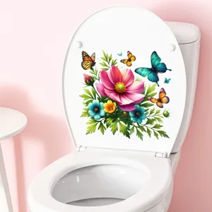 Detail of colorful flower and butterfly waterproof stickers on a white toilet lid.
