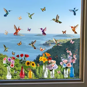 Vibrant hummingbird and flower static window stickers applied on clear glass surface