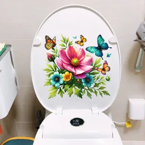Close-up of vibrant flower and butterfly waterproof decals on a white toilet lid