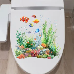 Detailed view of a colorful ocean-themed waterproof sticker on a white toilet lid.