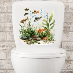 Detail of watercolor aquarium sticker applied on a white bathroom toilet