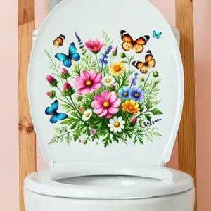 Detailed view of floral and butterfly waterproof stickers applied on a white toilet lid.